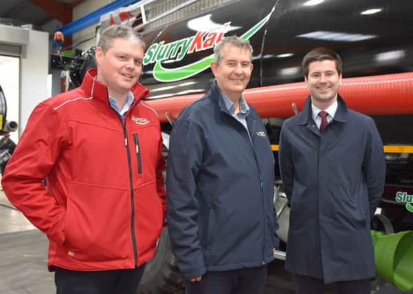 SlurryKat CEO Garth Cairns, left, with Daera Northern Ireland Agriculture Minister Edwin Poots, centre, and DUP MLA Jonathan Buckley. PICTURE: Chris McCullough